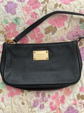 Michael Kors Black Pebbled Leather Wristlet with Gold Plaque Accent